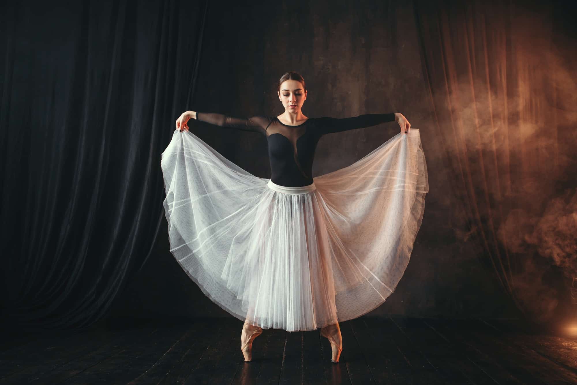 classical-ballet-dancer-in-motion-on-the-stage-1.jpg
