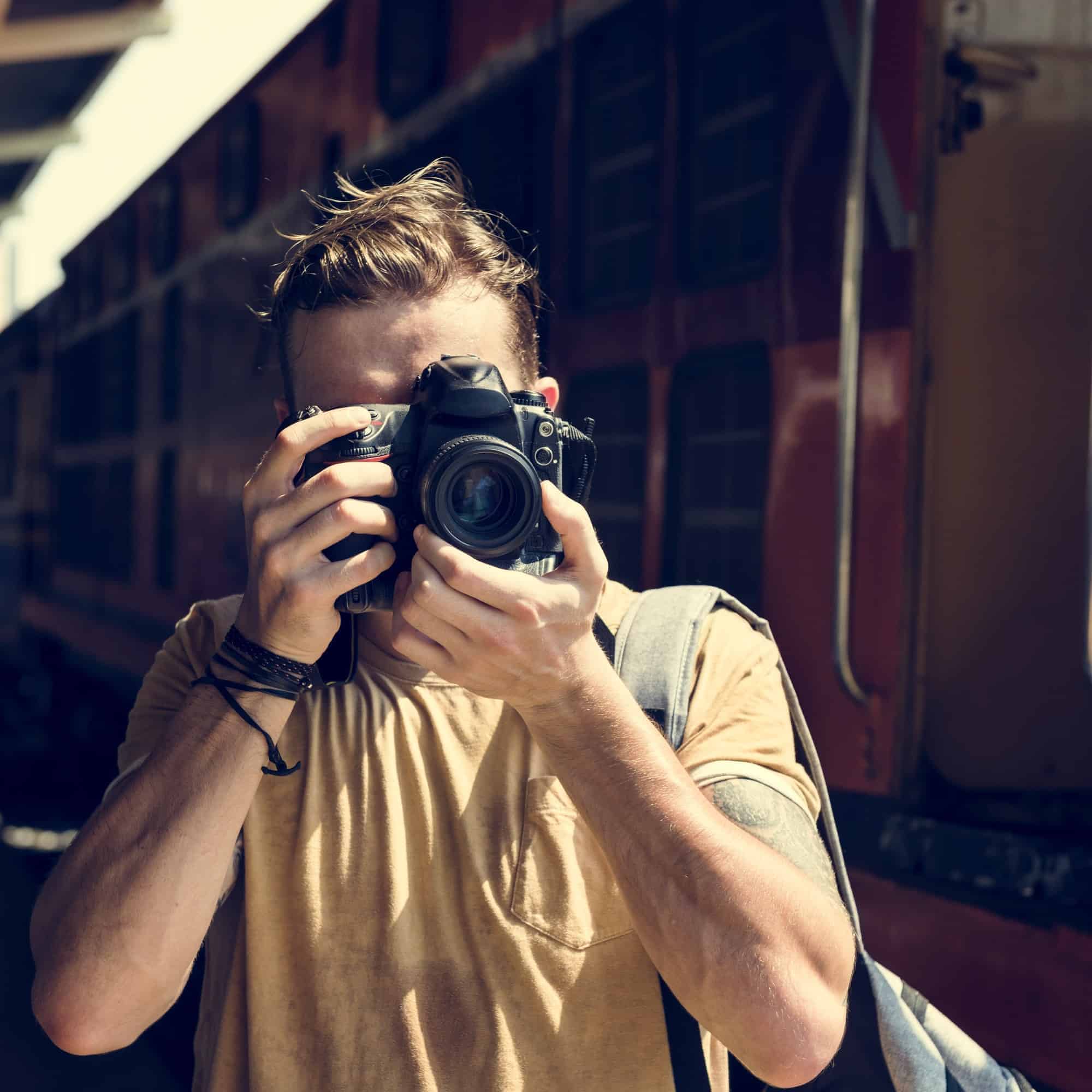 photographer-camera-dslr-shooting-journalist-concept-1.jpg
